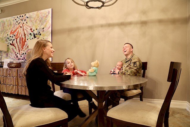 Army Lt. Col. Patrick "Pat" Miller and his family visit the Madigan Army Medical Center Fisher House at Joint Base Lewis-McChord. Pat's family stayed at the Fort Hood Carl R. Darnall Army Medical Center Fisher House when Pat was shot during an active shooter situation on the base.